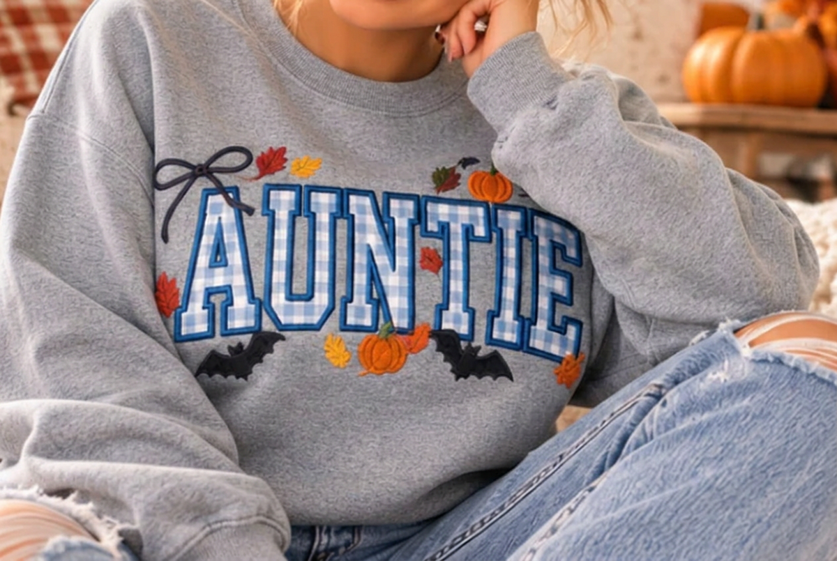 AI-generated Sport Grey crewneck mockup with fall AUNTIE gingham design